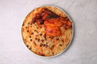 نص دجاج على الفحم مع رز