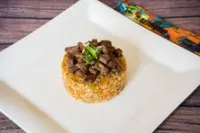 أرز مقلي بالخضار و لحم بقري