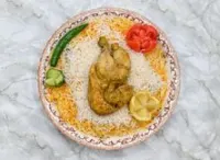 نصف دجاج مدفون مع الرز