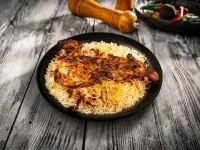 نصف دجاج علي الفحم مع أرز العاذرية - بمذاق خاص من انتاجنا