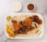 حبة دجاج على الفحم مع رز بشاوري